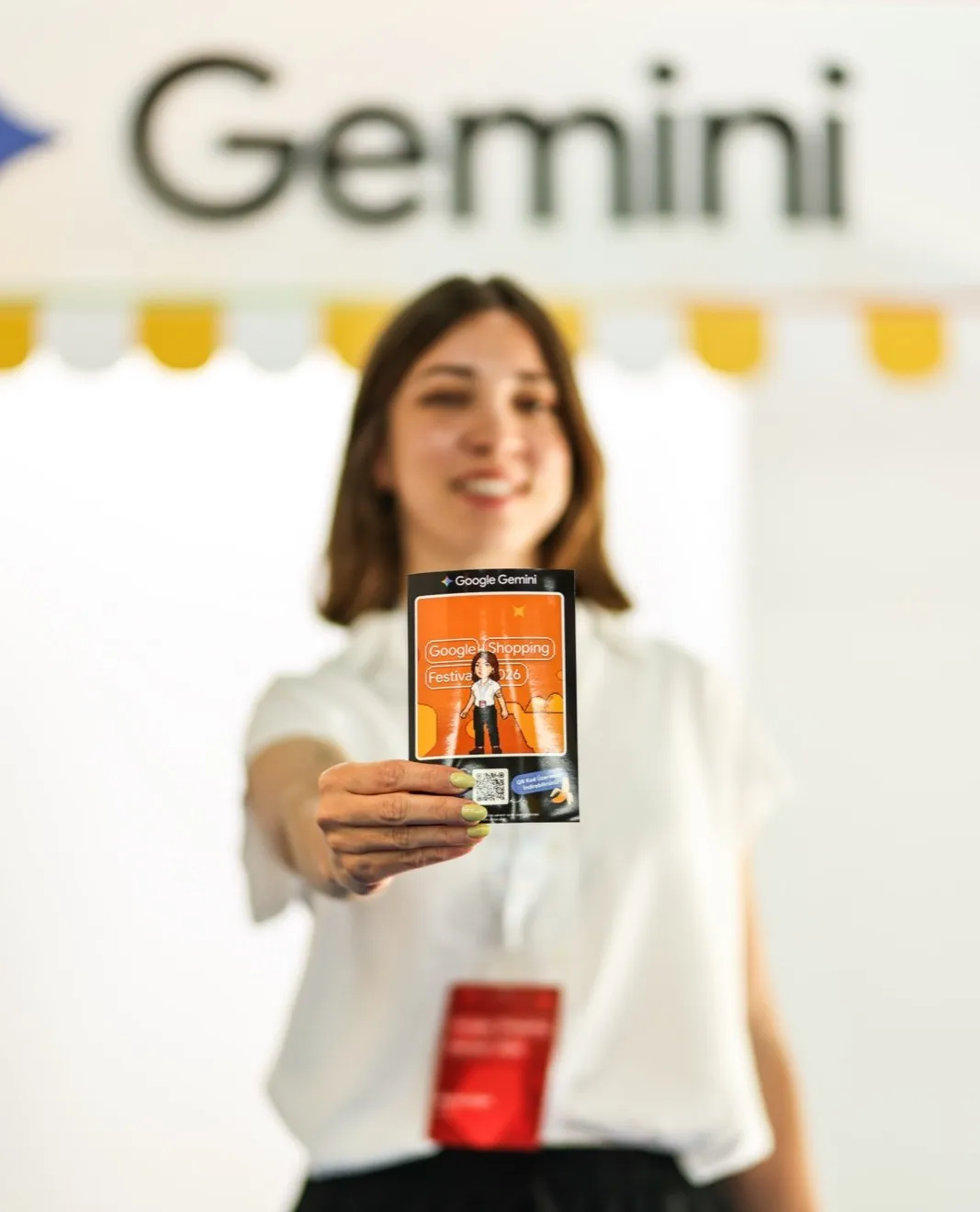 Guest holding her AI photobooth print at Google Shopping Fest